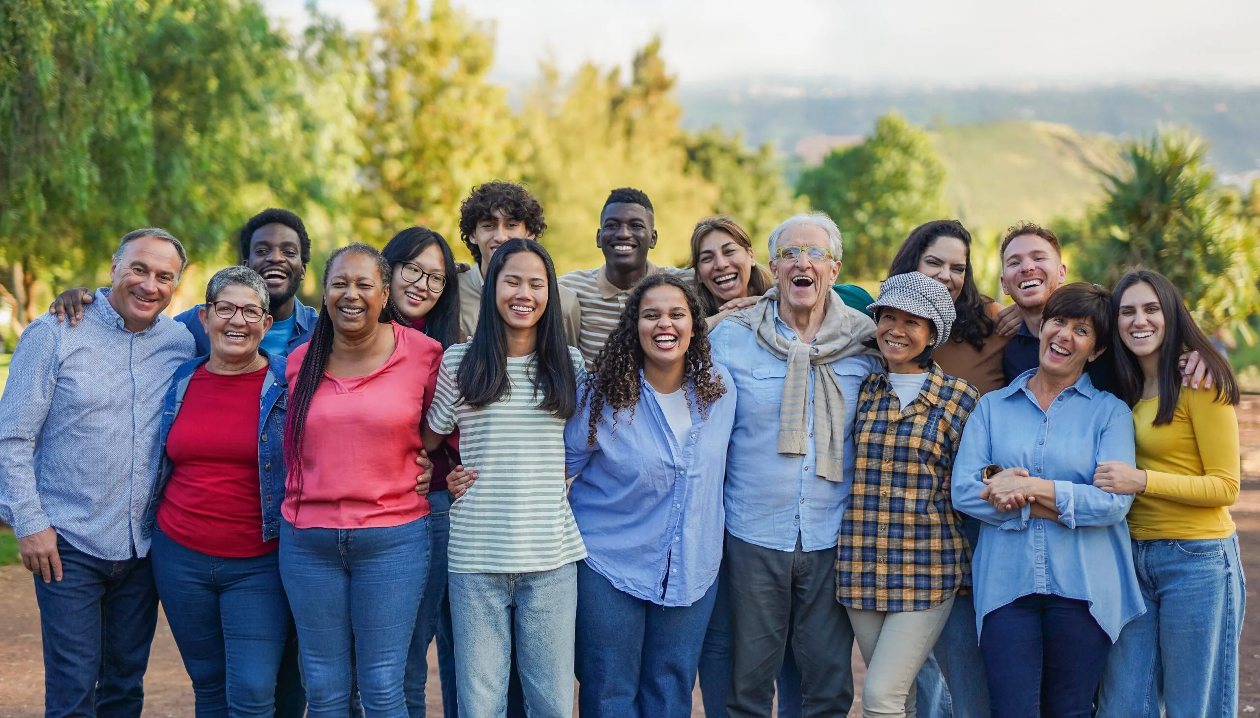 Large Group Poses For Happy Outdoor Portrait